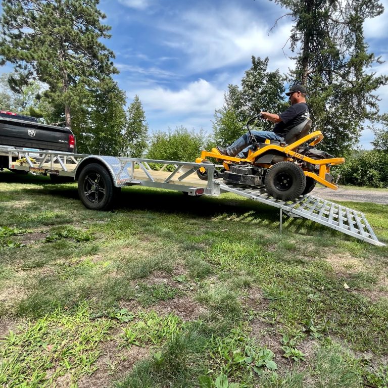 Standard drop legs are equipped on every bi-fold ramp assembly.