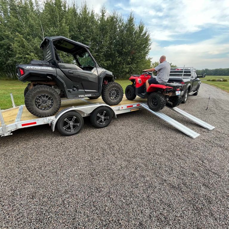 Ramps can be attached for sideloading ATVs and other small equipment.